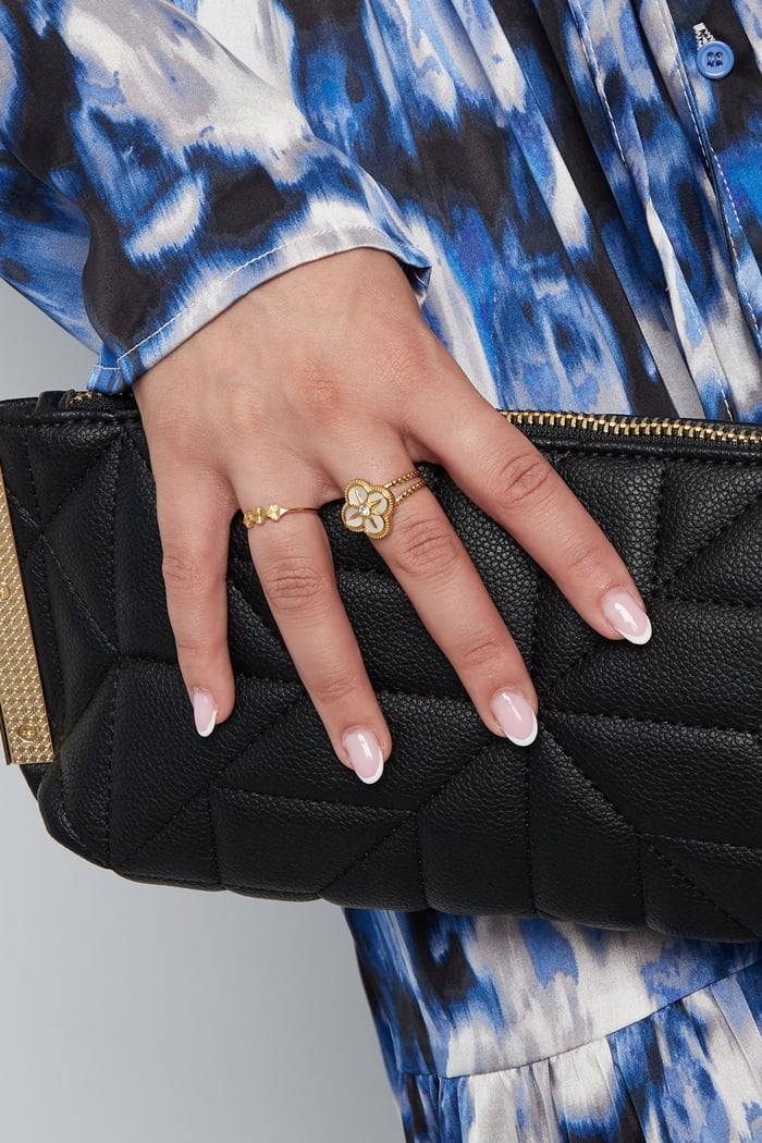 Triple elegant ring